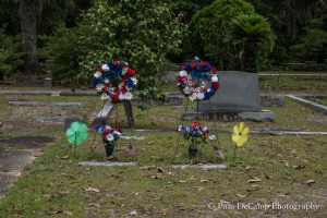 Patriotic flowers adorn graves at Bonaventure. This is the only image I could get with the wind blowing. It was still the rest of the time there.